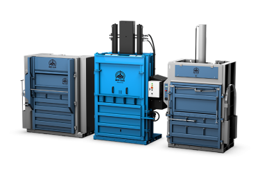 Three blue hydraulic cardboard balers