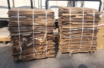 Strapped bales of cardboard