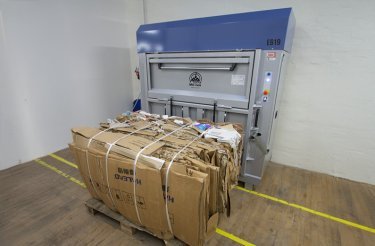 bale in front of electric baler